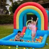 Szivárványszínű ugrálóvár csúszdával és labdamedencével